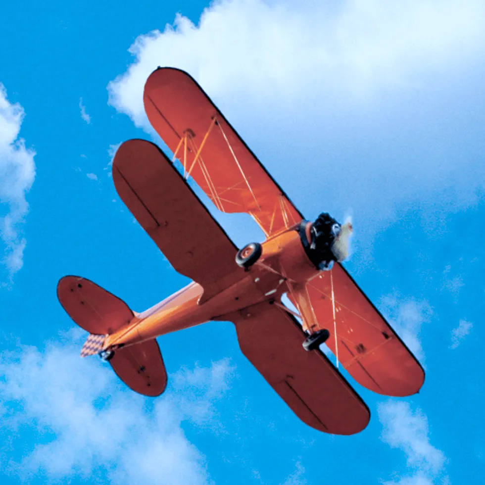 orange-aircraft-in-sky Orange Aircraft In Sky