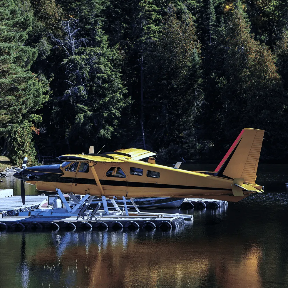 yellow-aircraft-on-water-at-pier Yellow Aircraft On Water At Pier